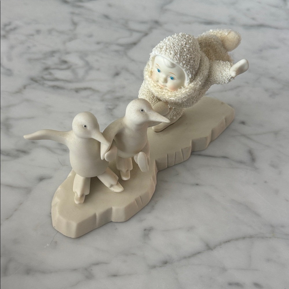 Ivory Porcelain Ice Skating Figurine with Penguins